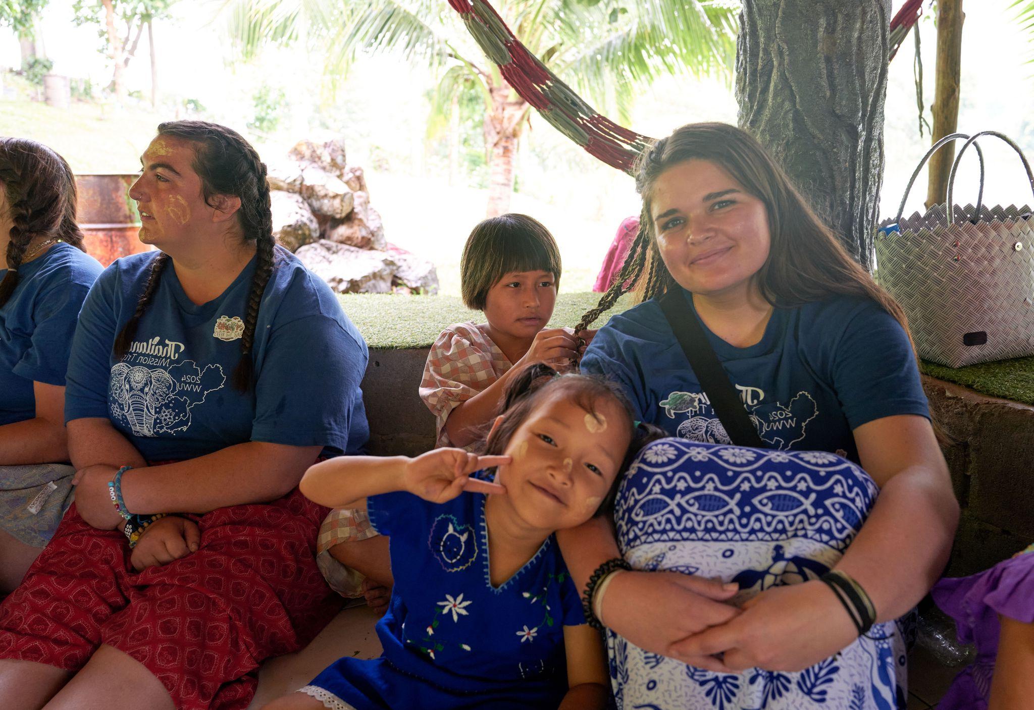 Some WWU student volunteers with children from the Bamboo School